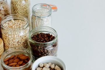 Various cereals, coffee, nuts, bran in glass jars. Zero waste concept, free plastic.