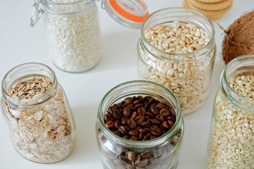 Various cereals, coffee, nuts, bran in glass jars. Zero waste concept, free plastic.