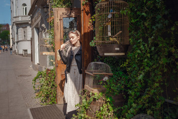 Beautiful woman walks through the streets of Moscow