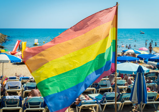 Gay pride flag blowing in the wind on Sitges, in Barcelona province. Perhaps Spain top gay destination, with LGTB events like Gay carnival, pride and Gay Spring break.