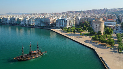 Naklejka premium Aerial drone view of iconic historic landmark - old byzantine White Tower of Thessaloniki or Salonica, North Greece