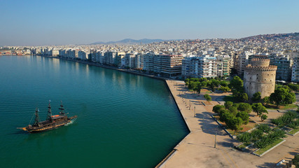 Fototapeta na wymiar Aerial drone view of iconic historic landmark - old byzantine White Tower of Thessaloniki or Salonica, North Greece