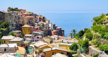 MANAROLA, ITALY - JULY 4, 2019: Beautiful fishing village in Cinque Terre with colorful facades and sea view 