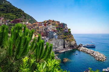 MANAROLA, ITALY - JULY 4, 2019: Beautiful fishing village in Cinque Terre with colorful facades and sea view 