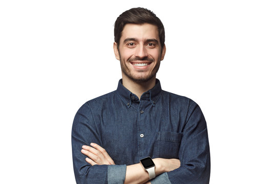 Portrait Of Smiling Business Man With Crossed Arms Looking At Camera With Smile, Isolated On White Background