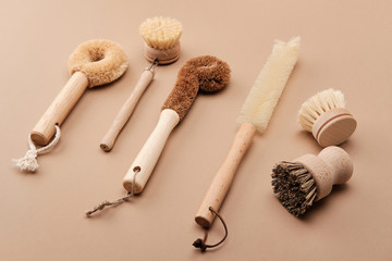 Kitchen Dish Brushes in Brown Ceramic Cup. Zero waste 