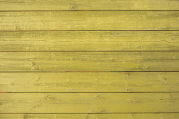 Obraz na płótnie Canvas Yellow wooden background texture. Horizontal planks, bars