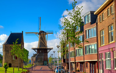 A windmill in the city of Delft in The Netherlands on a sunny day.
