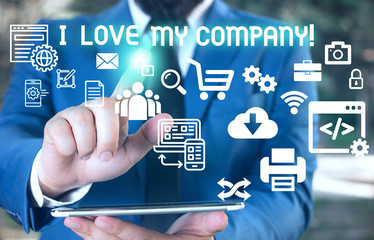 Word writing text I Love My Company. Business photo showcasing tell why admire their job and workplace Male human wear formal work suit presenting presentation using smart device