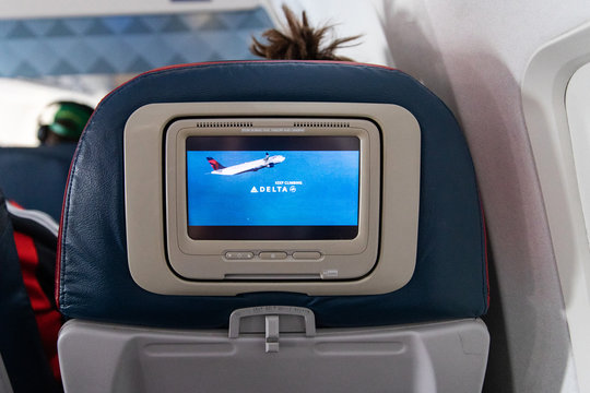 Las Vegas, Nevada - August 20, 2019: Delta Airlines comfort zone seats in flight over Las Vegas, Nevada
