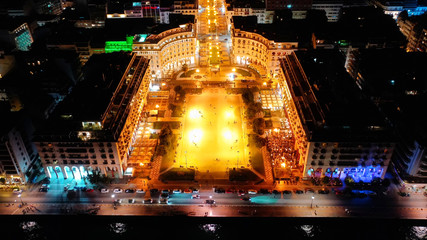 Aerial drone night shot of iconic illuminated Aristotelous square in the heart of Thessalloniki or Salonica, North Greece