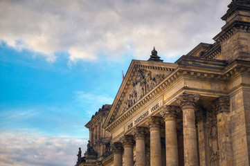 Obraz premium The Reichstag building located in Berlin, Germany which houses the German parliament, the Bundestag.