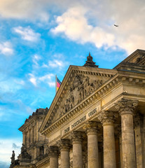 Obraz premium The Reichstag building located in Berlin, Germany which houses the German parliament, the Bundestag.