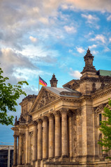 Obraz premium The Reichstag building located in Berlin, Germany which houses the German parliament, the Bundestag.