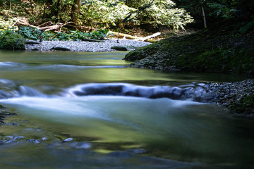 Naklejka premium Flowing cascades in the scenic eistobel Canyon in the bavarian Allgau, Germany, Europe