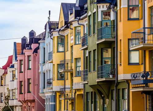 Helsinki, Finland, August 10, 2019: Colorful houses along the most beautiful street Huvilakatu in Helsinki, Finland