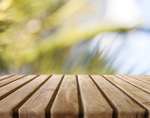 Abstract blur bokeh background with wooden desk