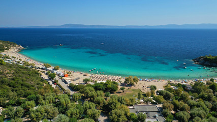 Naklejka premium Aerial drone photo of iconic paradise bay and sandy beach of Porto Koufo with turquoise calm sea protected by winds, South Sithonia Peninsula, North Greece