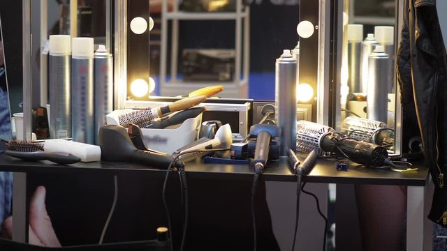 Make-up artist table with hair products and tools in 4k slow motion 60fps