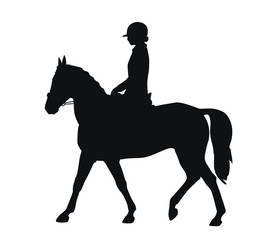 Silhouette of a young athlete performs on a sports pony