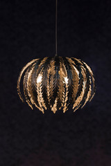 Modern pendant chandelier, on a black background isolate