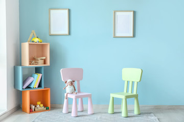 Stylish interior of modern playroom in kindergarten