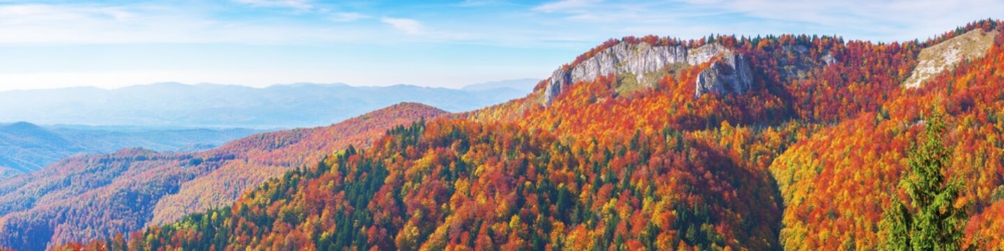 great view of carpathian mountain landscape.  wonderful afternoon panorama of apuseni natural park. trees in fall foliage. rocks on the hill top. pietrele negre located in bihor country, romania