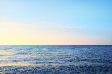 Colorful purple sunset over blue open Baltic sea