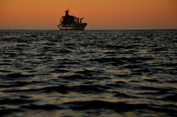 Obraz premium lighthouse at sunset