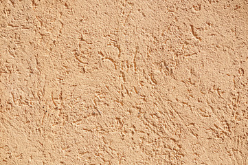 Sandy-colored modern grainy stucco texture