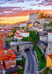 Porto, Portugal. Top view aerial cityscape panorama of old town during beautiful evening sunset....