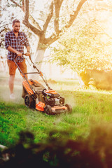 Gardening details and landscaping. Close up portrait of gardener worker