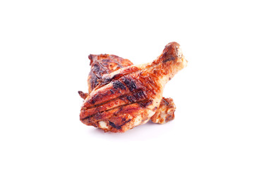 beautiful roasted chicken drumsticks on a white background,grilled chicken legs isolated