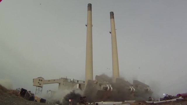 An old power plant is blown up to make way for cleaner energy.