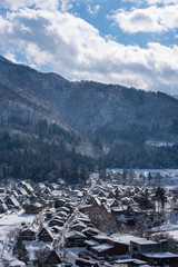 The overlooking view of Shirakawa-go after snow falling and soak in the sunshine, winter in Japan.