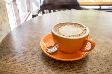 Cappuccino coffee with heart latte art