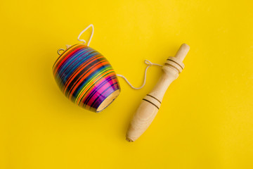 mexican toys, Balero from Wooden in Mexico on yellow background