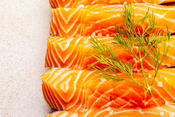 Slices of fresh salmon. Ingredient for cooking healthy seafood. Concept omega 3 containing food