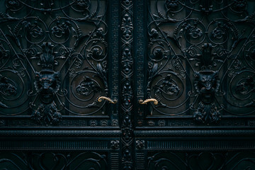 Wrought Iron Doors with Gold Handles