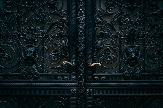 Wrought Iron Doors with Gold Handles