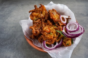 Gluten free Onion Fritters /Kerala Ulli Vada made of chickpea flour, selective focus