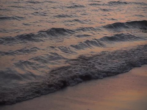 Waves at the beach sunset beautiful moving Full HD 1920x1080 with copy space for text.