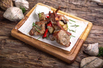 Rack of lamb. Ribs. Delicious juicy steak beef or pork. A big piece of grilled meat