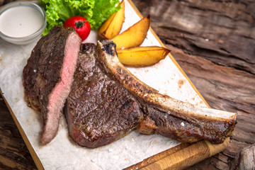 Neck steak, tenderloin or filet mignon pork or beef. Juicy tasty piece of meat. Delicious juicy...