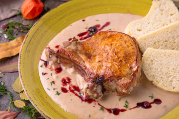 Oven Baked rabbit legs or shoulder lamb or pork with mushrooms in creamy mustard sauce. Beautiful stylish menu. 