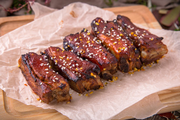 Grilled Pork Ribs. Tasty juicy meat with spicy tomato sauce