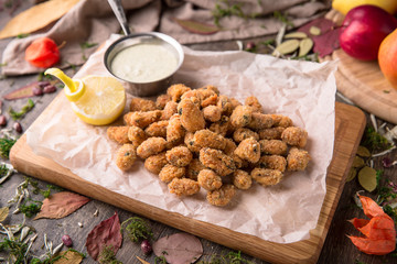 Crunchy Breaded mozzarella cheese sticks with mustard sauce. Beautiful stylish menu. Snack to beer.