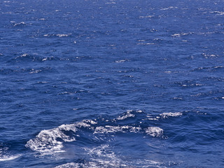 Fototapeta premium Close up on waves of deep blue sea.