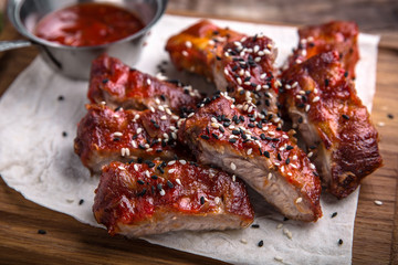 Grilled Pork Ribs. Tasty juicy meat with spicy tomato sauce