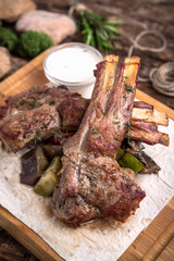 Rack of lamb. Ribs. Delicious juicy steak beef or pork. A big piece of grilled meat